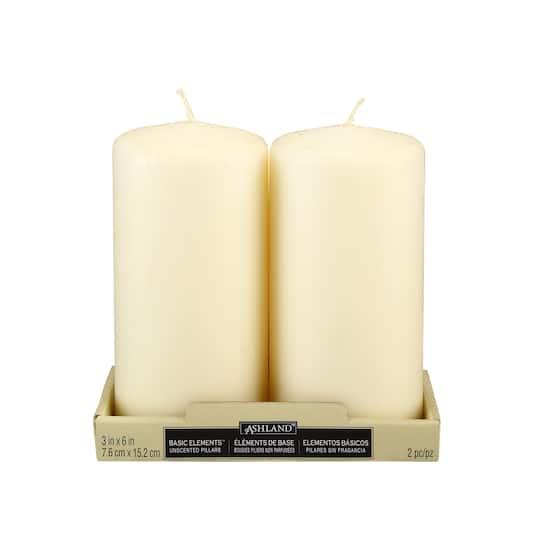12 Packs: 2 ct. (24 total) Ivory Pillar Candle Pair by Ashland®